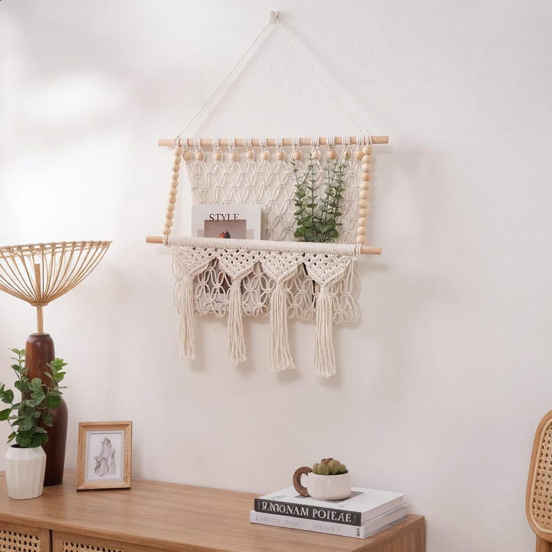 Macrame Wall Hanging Shelf with Storage Pocket, Woven Tapestry Magazine Rack, Cream Natural Wood Beads, 17.71 x 19.68 inches