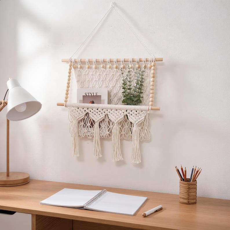 Macrame Wall Hanging Shelf with Storage Pocket, Woven Tapestry Magazine Rack, Cream Natural Wood Beads, 17.71 x 19.68 inches